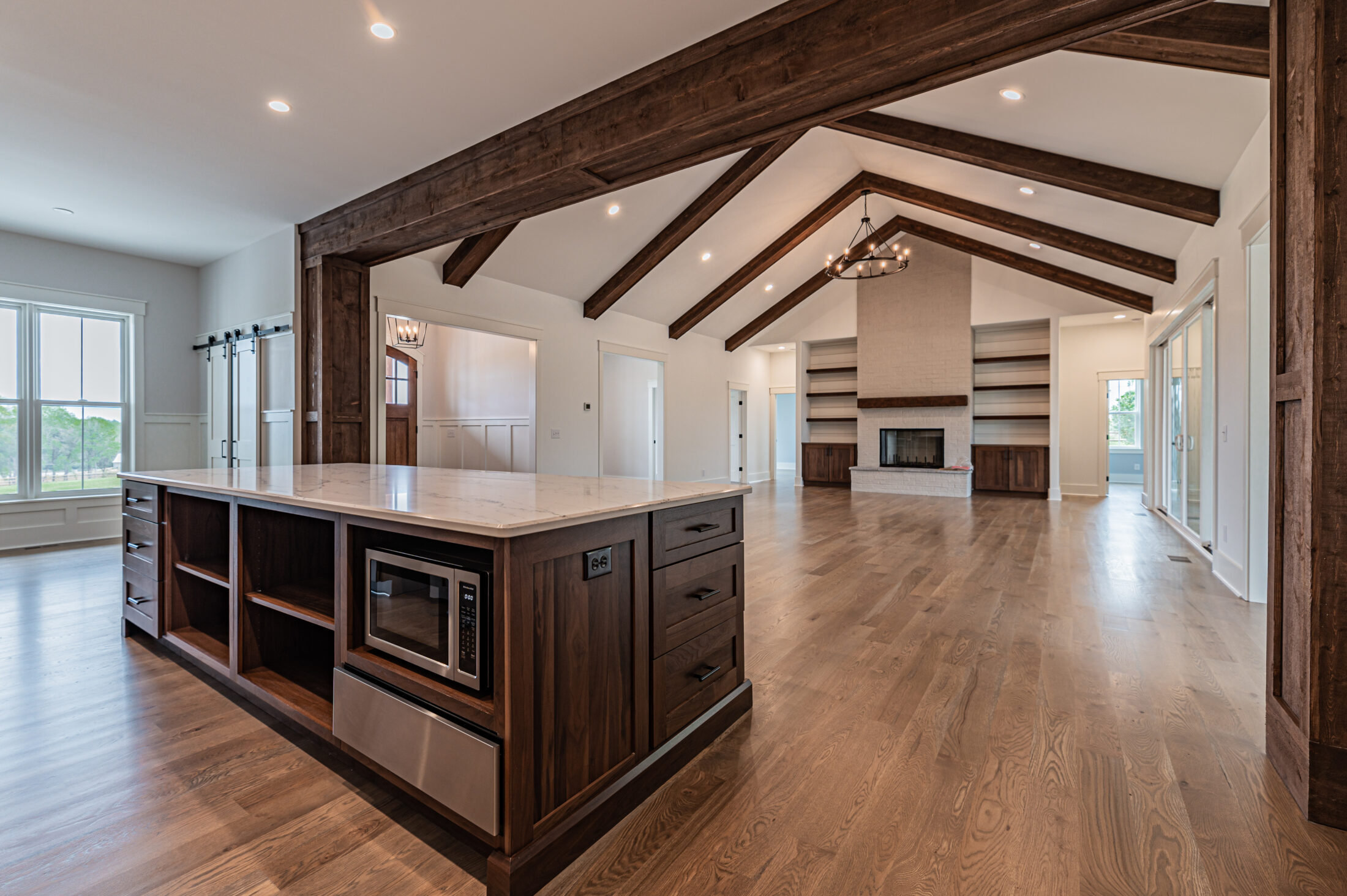 Open kitchen and living area in a Southern Pines equestrian custom home