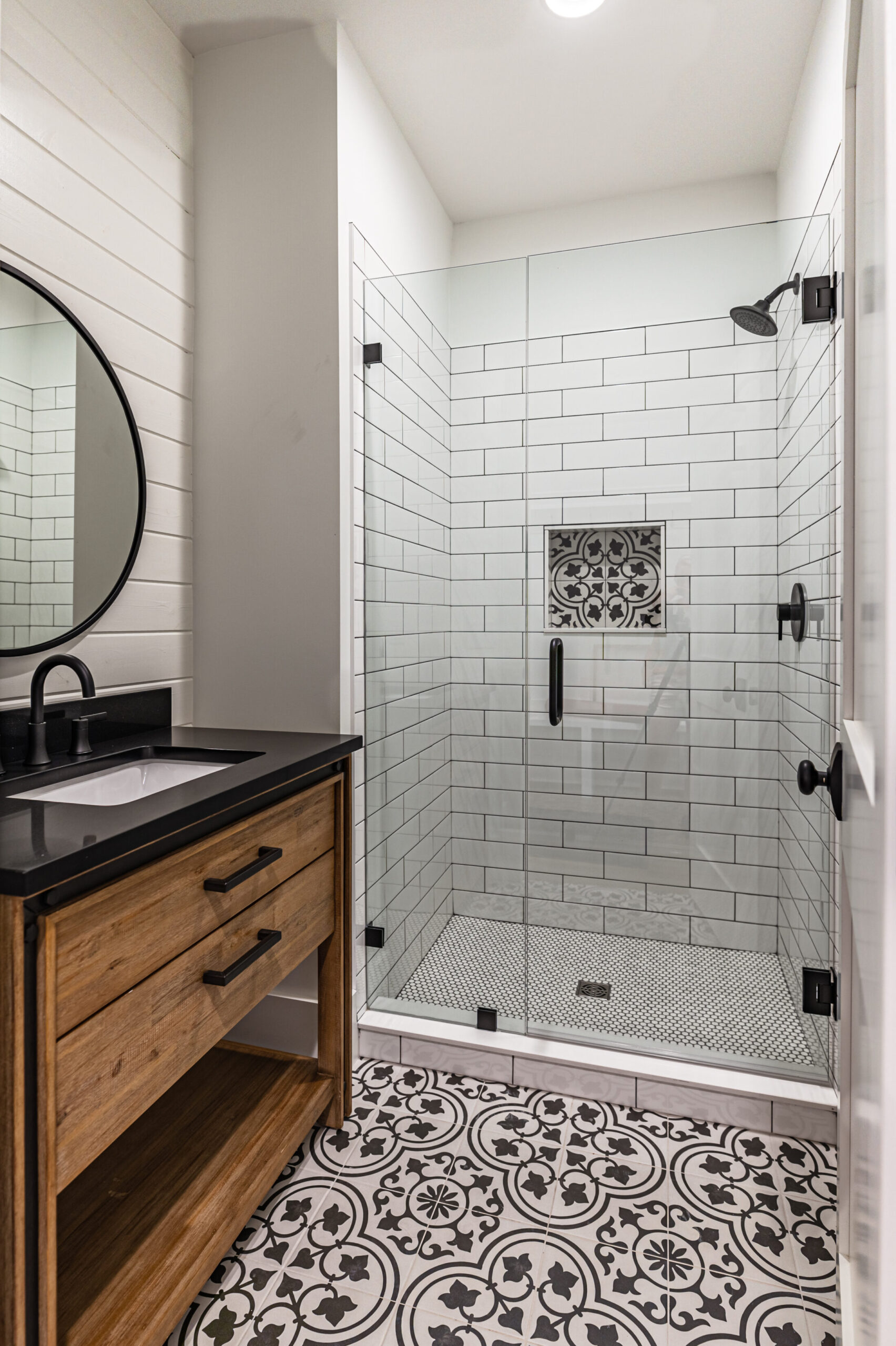 Primary bathroom shower in a Southern Pines equestrian custom home