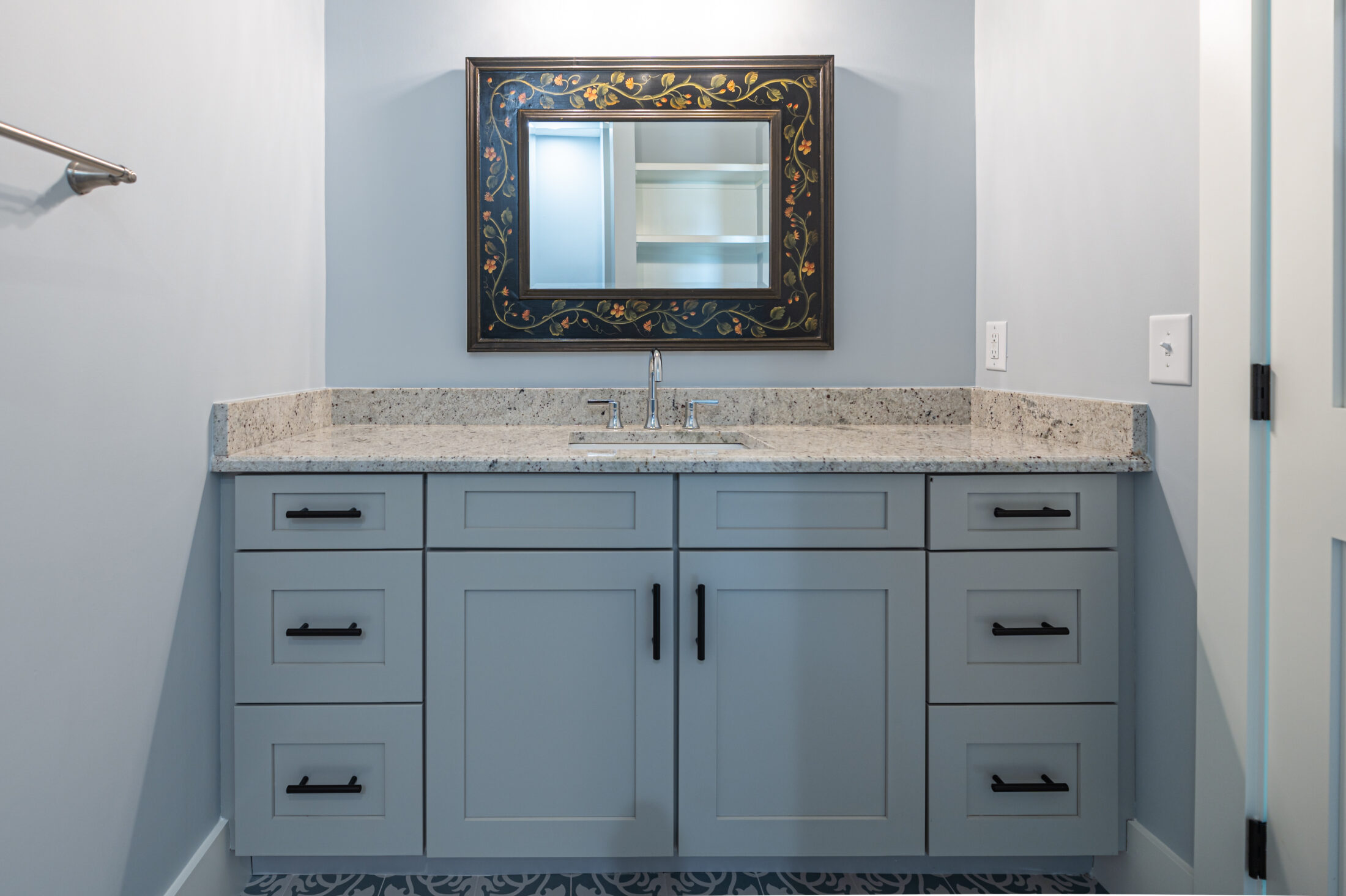 Secondary bath vanity in a Southern Pines equestrian custom home