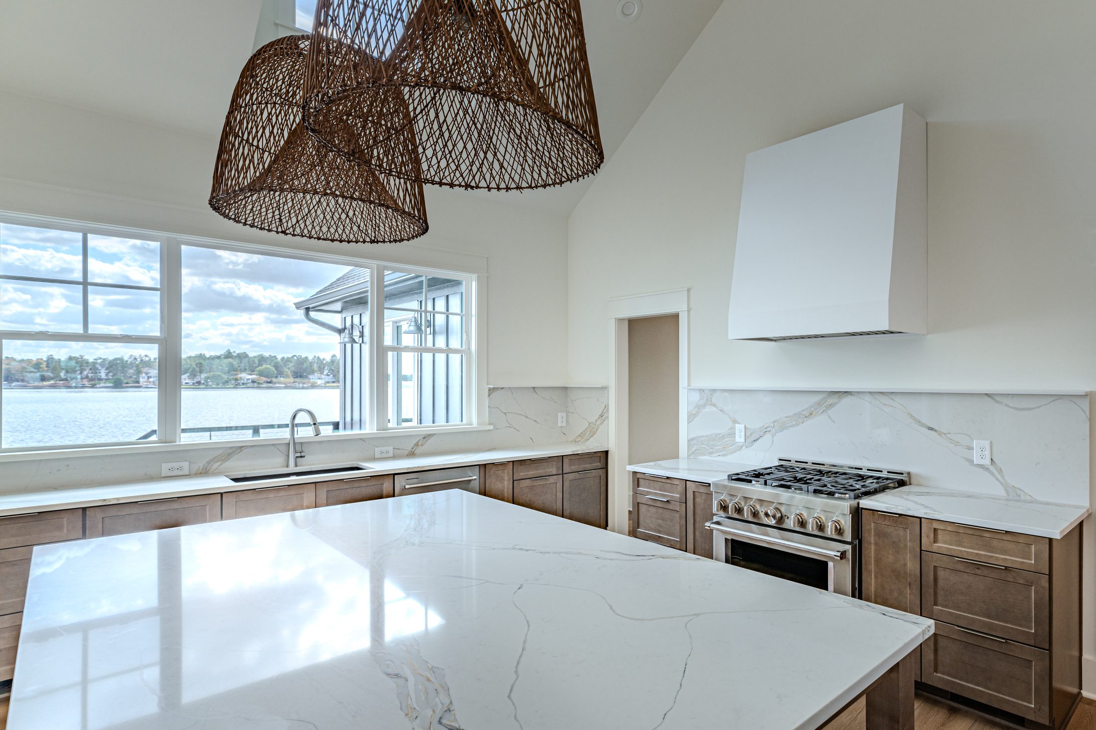 Kitchen range, hood, and cabinetry detail