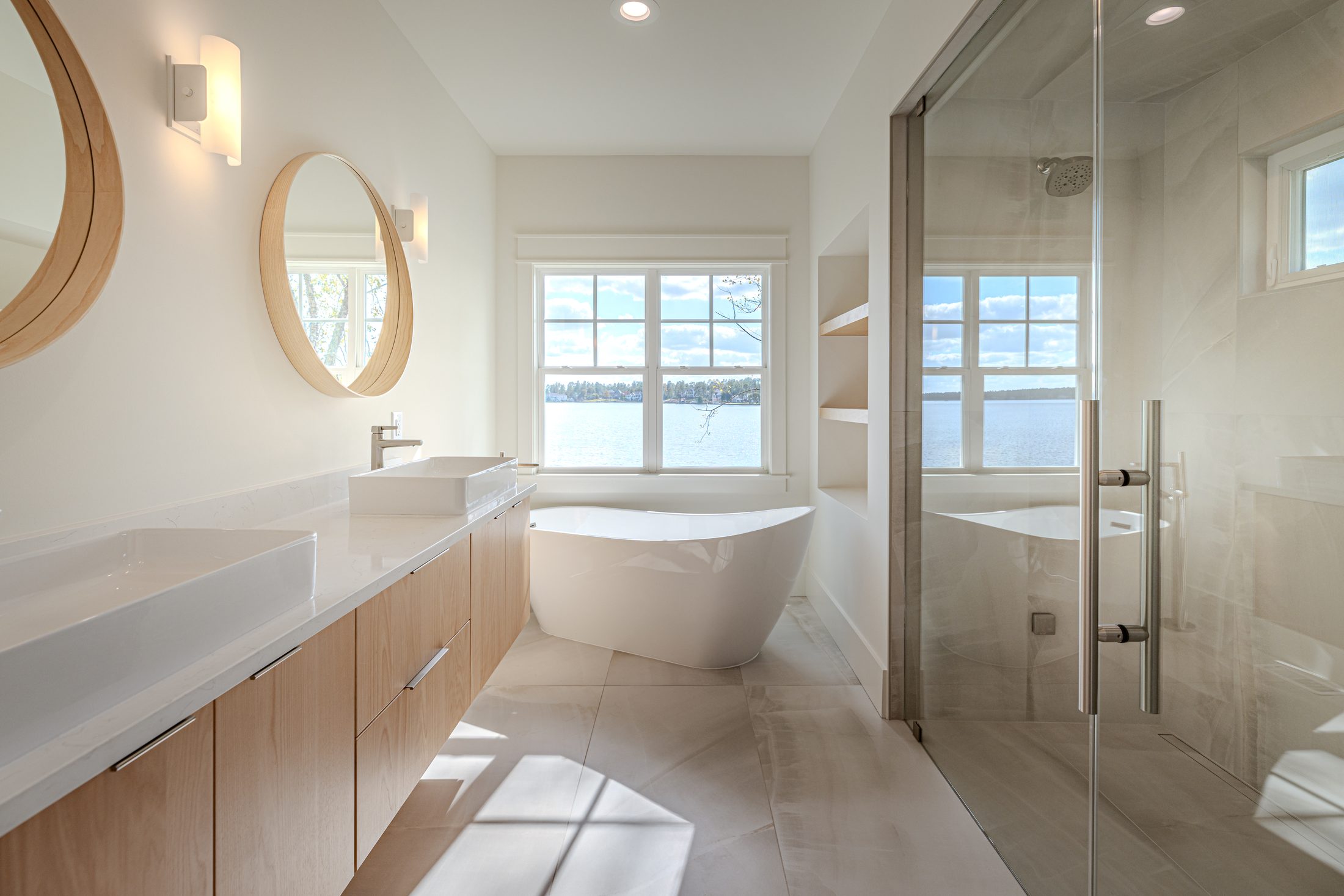 Primary bathroom with freestanding tub and glass shower