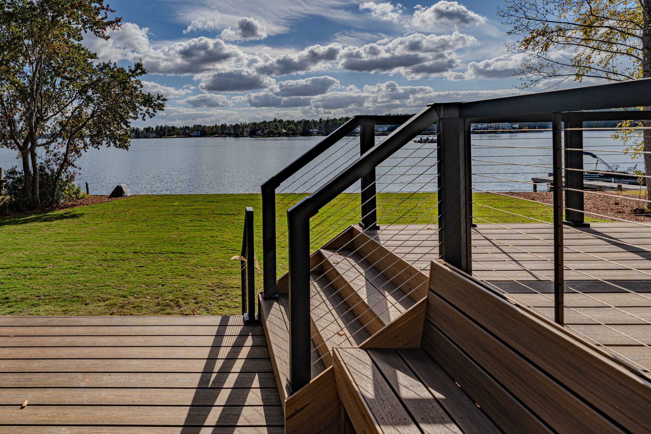 Deck railing and water view at a Lake Auman custom home