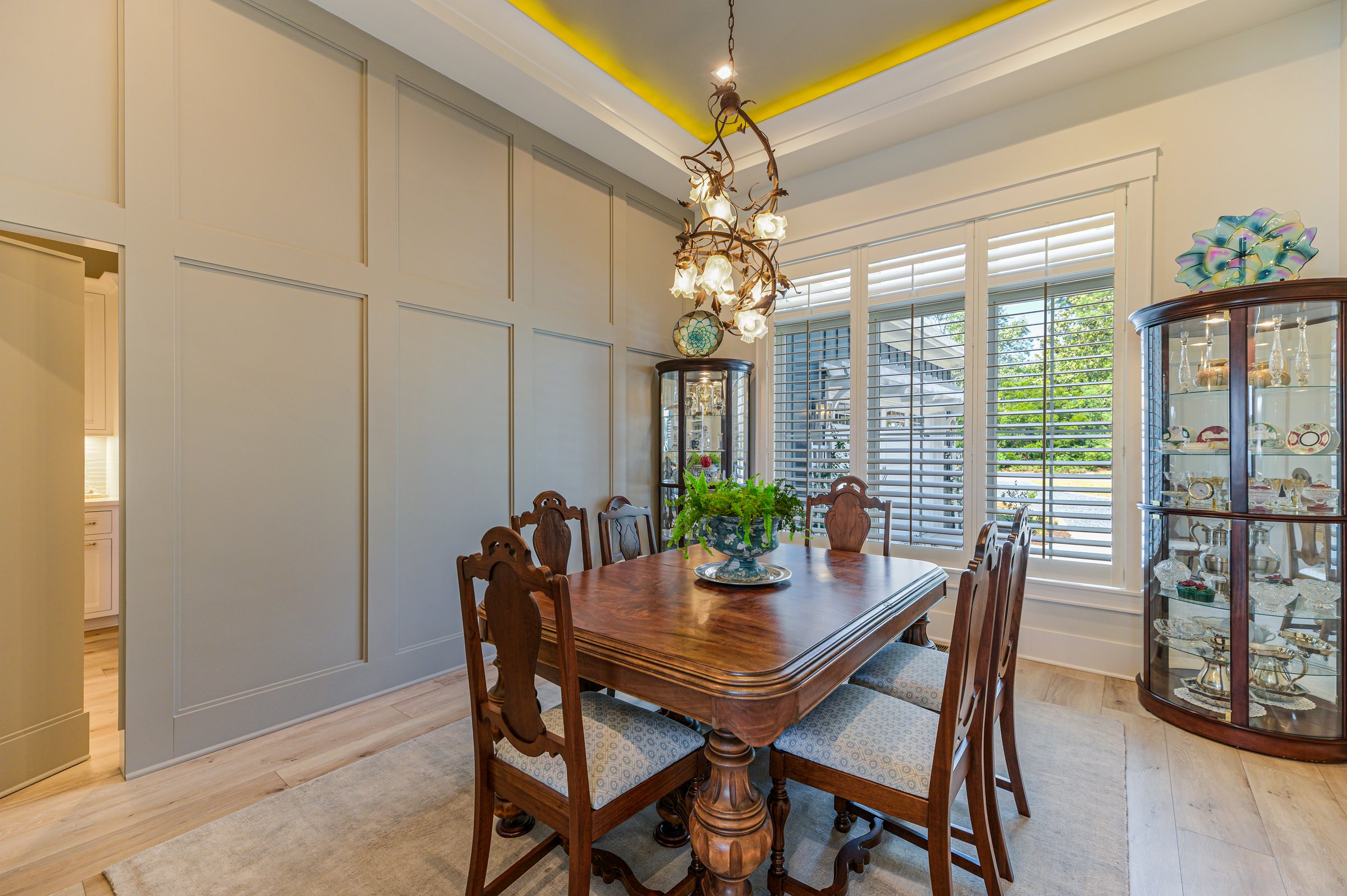 Outdoor living custom home on Lake Auman in Seven Lakes NC — dining room