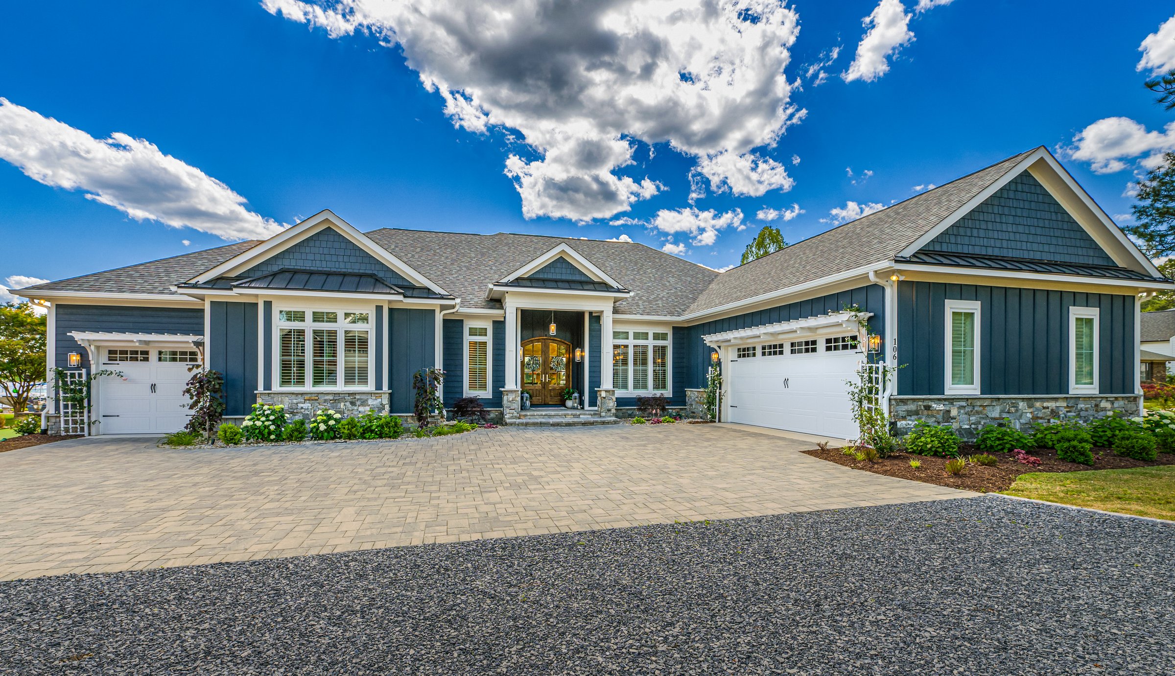 Outdoor living custom home on Lake Auman in Seven Lakes NC — front exterior