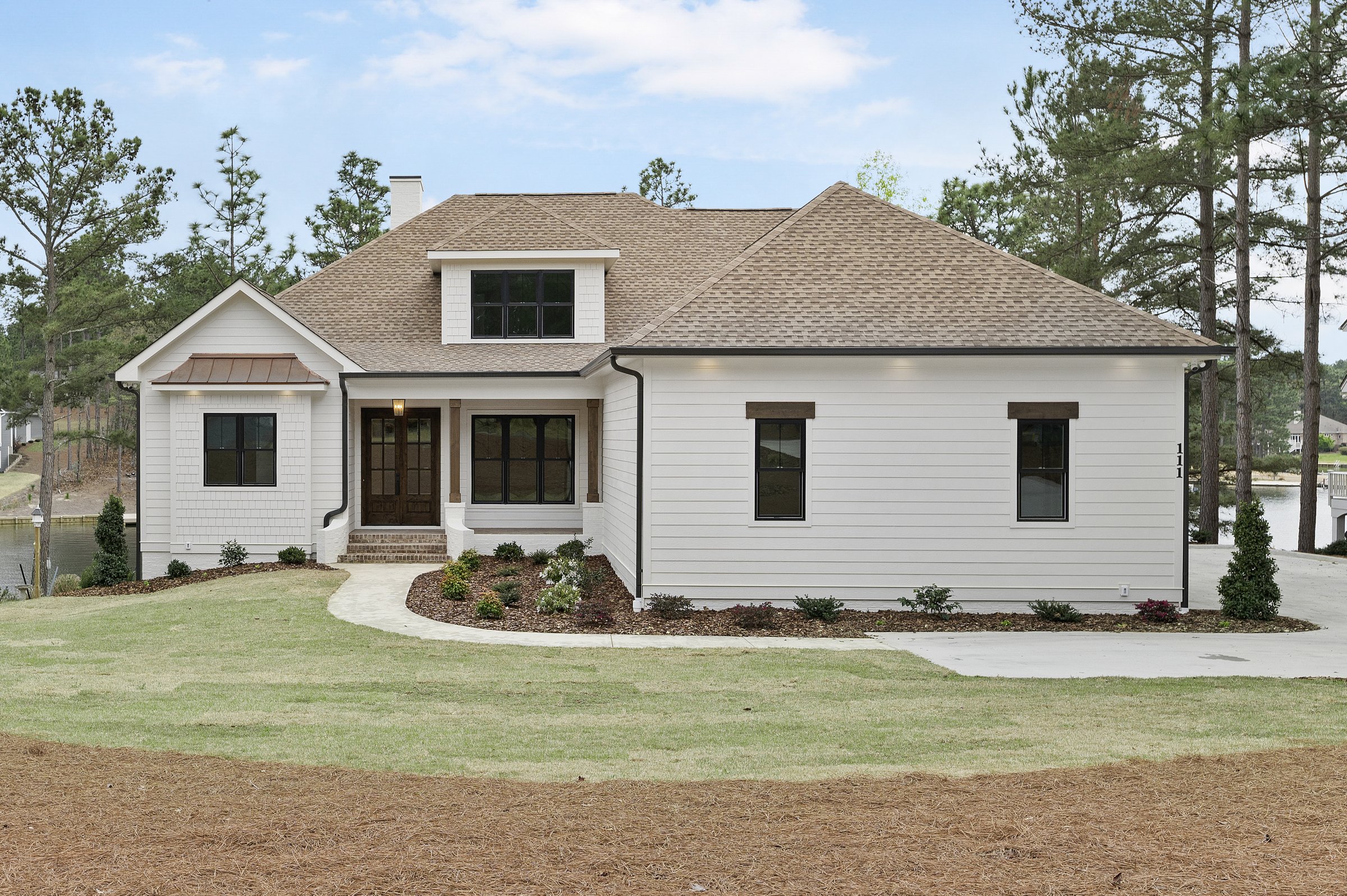 Lakeside custom home on Lake Auman in Seven Lakes NC — front exterior