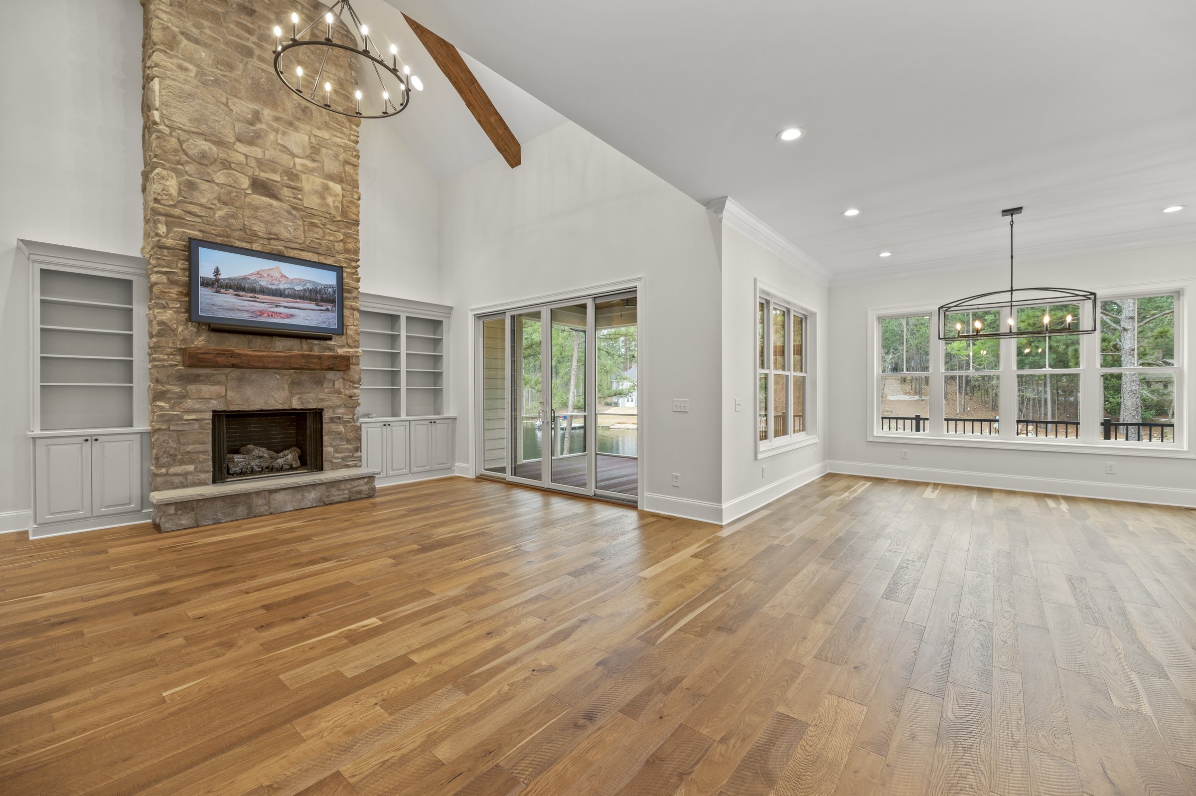 Lakeside custom home on Lake Auman in Seven Lakes NC — great room
