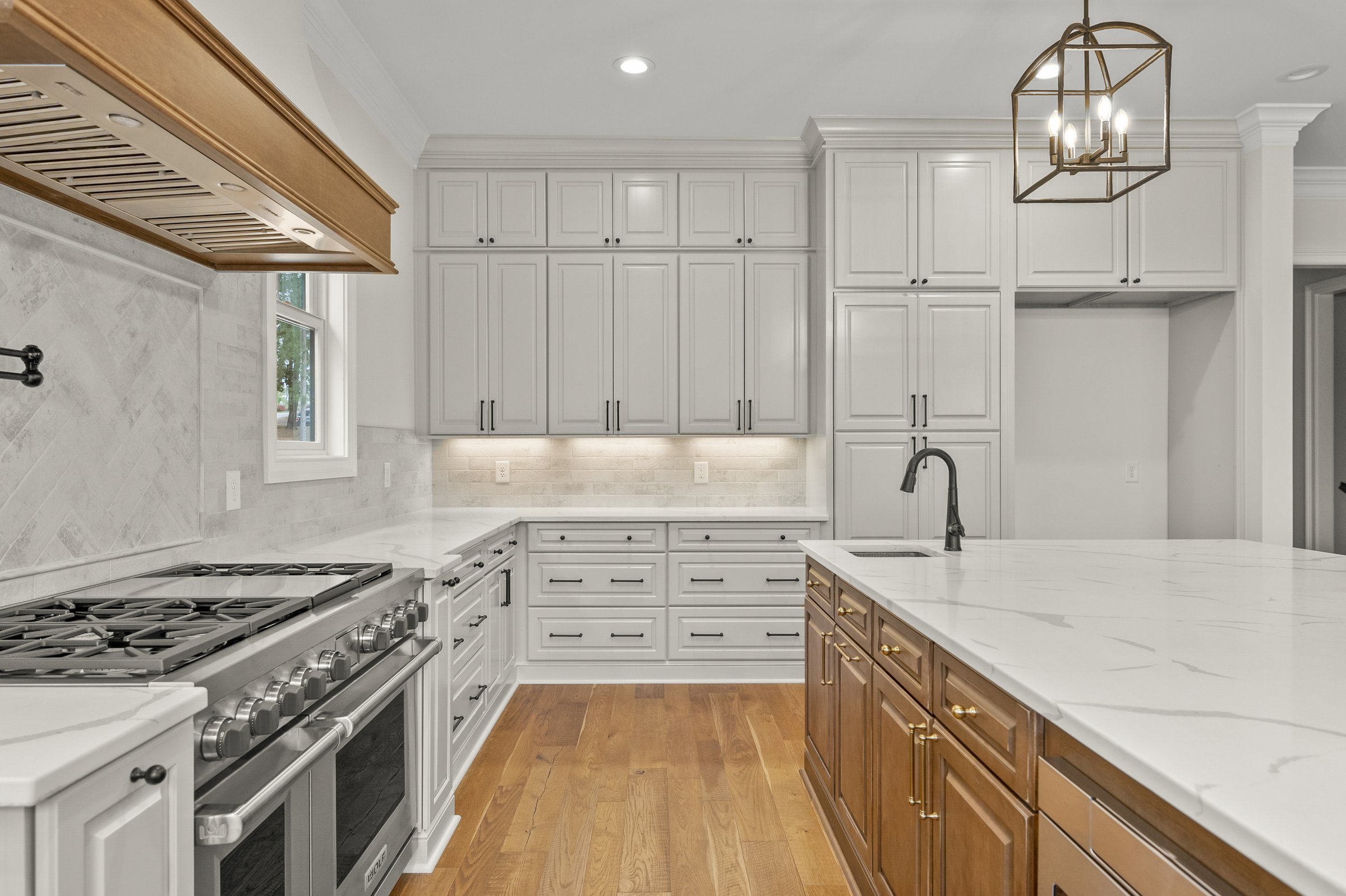 Lakeside custom home on Lake Auman in Seven Lakes NC — range and hood