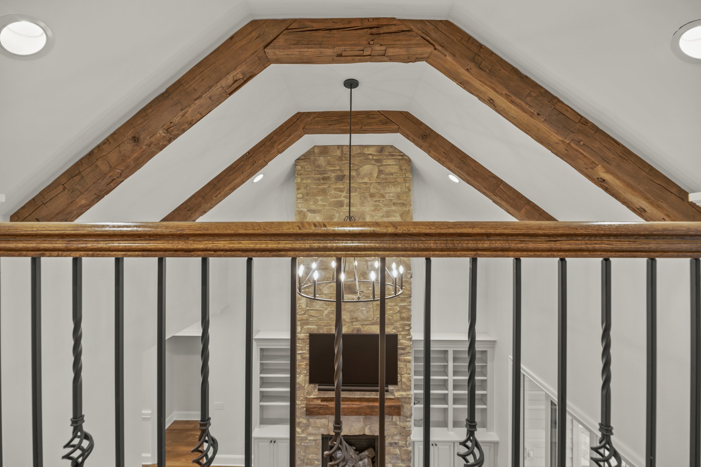 Lakeside custom home on Lake Auman in Seven Lakes NC — timber stair detail