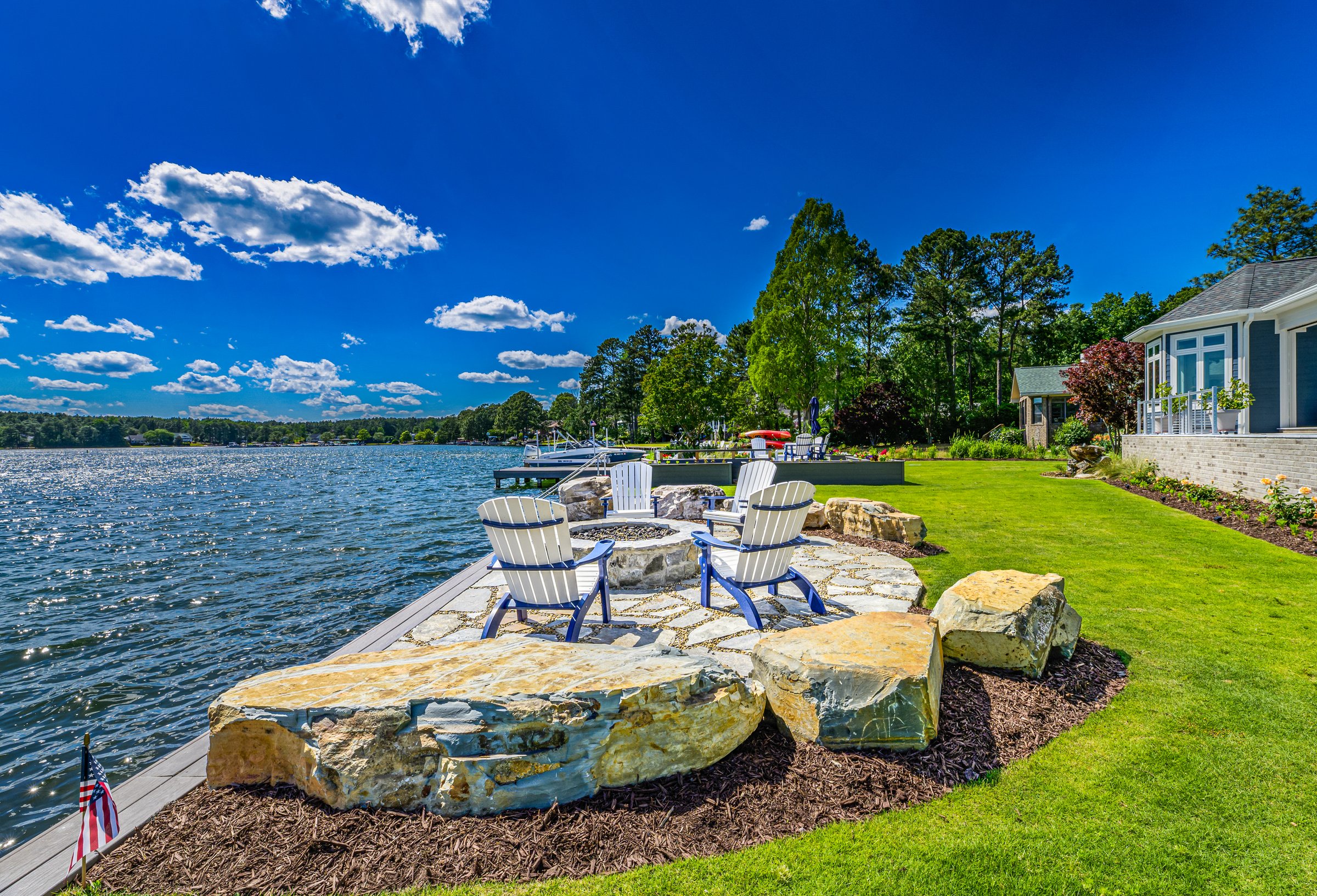Outdoor living custom home on Lake Auman in Seven Lakes NC — waterfront firepit