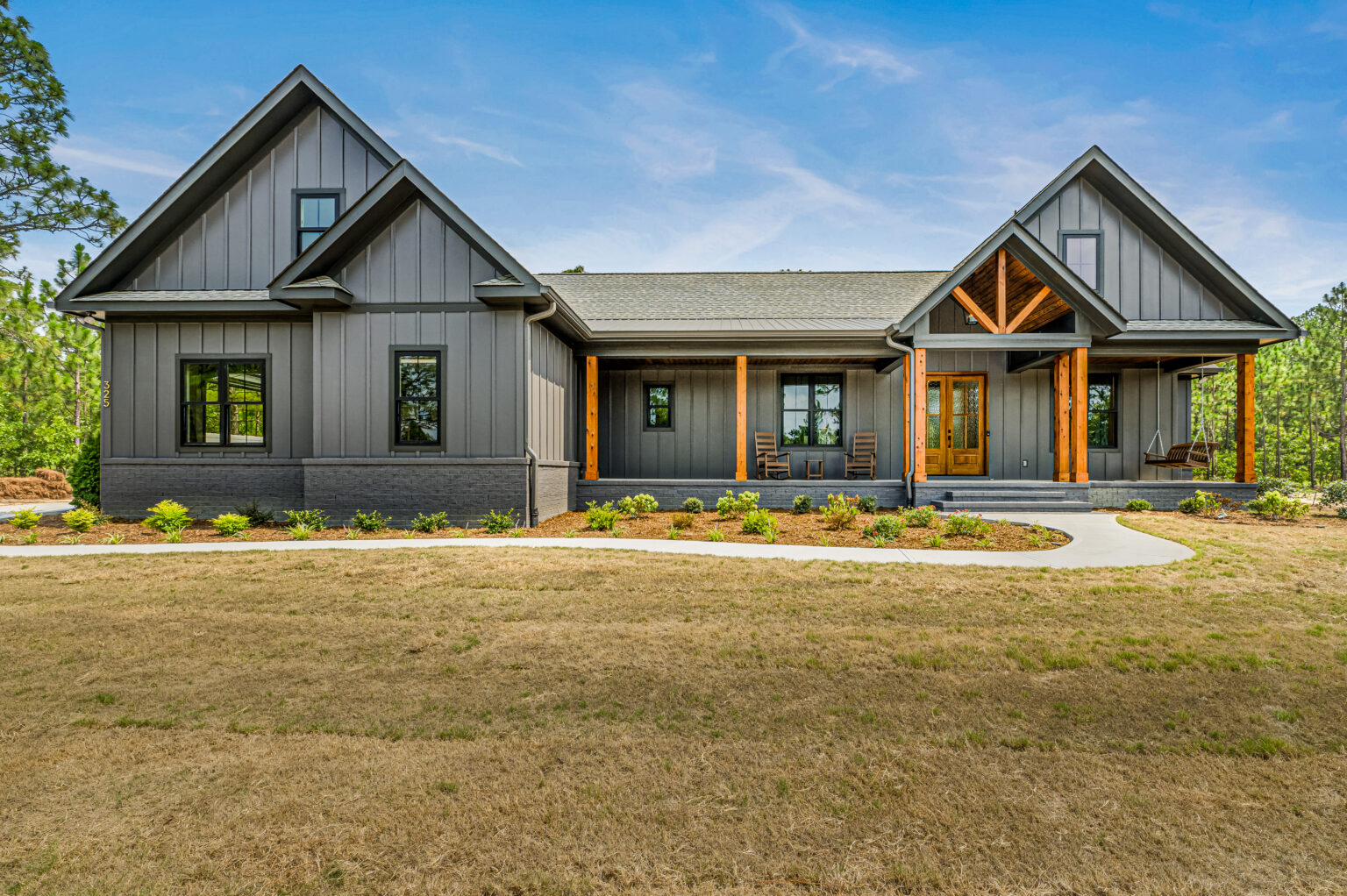 Craftsman-inspired custom home in Arbor Creek, West End NC with timber entry